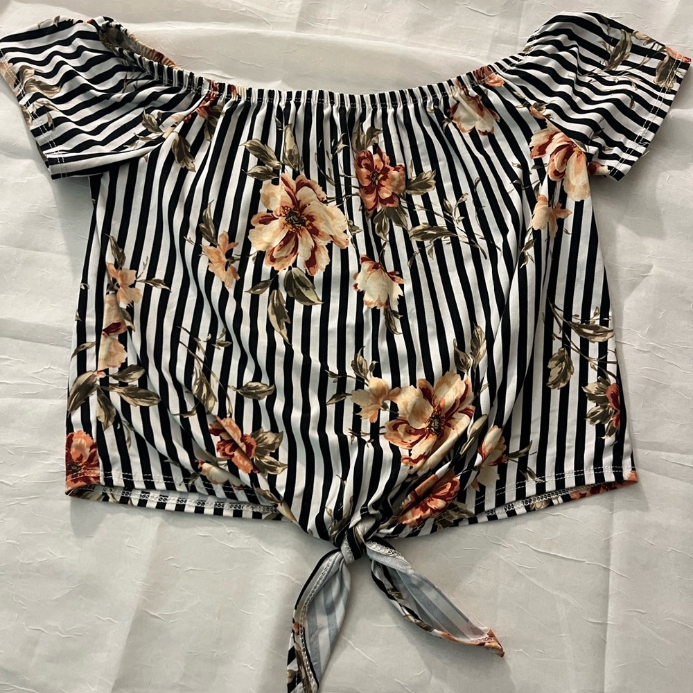 Fun off-the-shoulder (or on, if preferred) striped top. Size